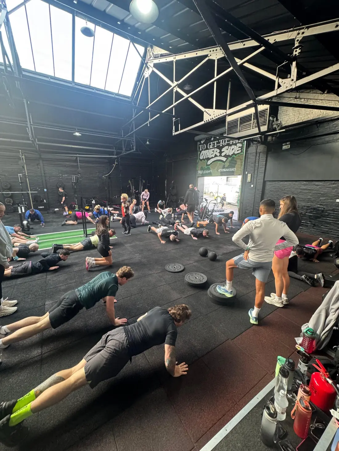 A class in full swing on the turf at Commando X-Fit