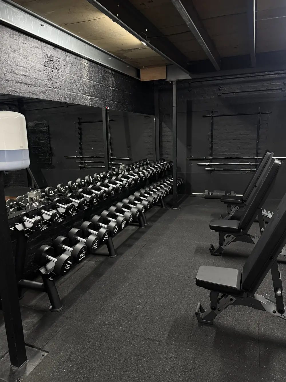 Dumbbell racks and benches at Commando X-Fit