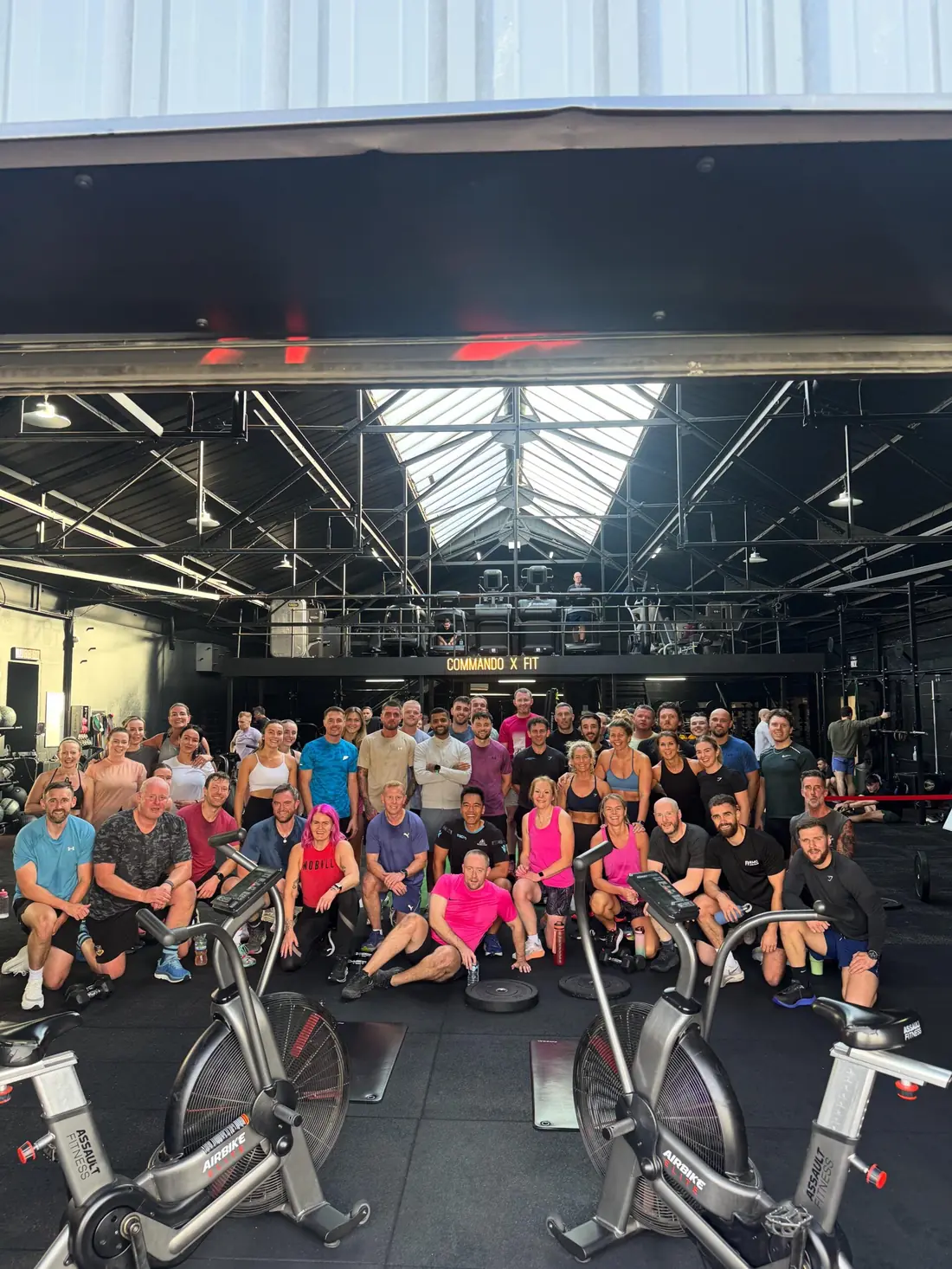 Commando X-Fit members and coaches together on the gym floor after a class