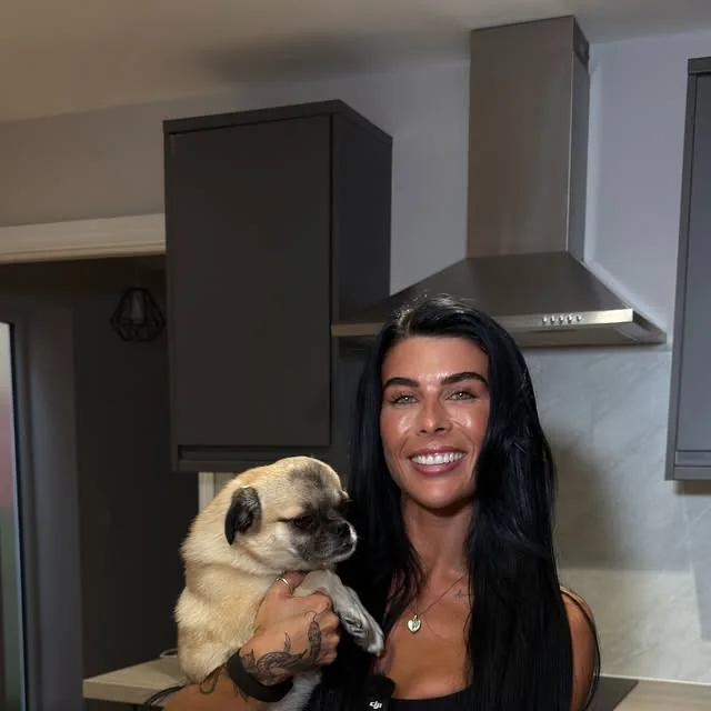 Lowri holding Theo the dog
