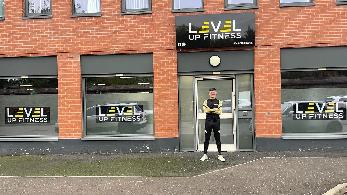 The front of Level Up Fitness at 23 Henry Place, Belfast, with the sign above the door